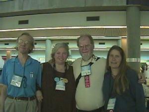 2002: WorldCon: Larry's latest writing partner, Brenda Cooper was also at World Con. She posed with Ted and Carol too.