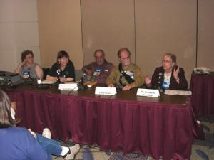 2003: Larry at Torcon 3 (Worldcon 61) during the Panel - Heinlein's Women "Just like the girl who married dear old dad" From left to right: Pat York, ?, David Silver, Larry Niven, Dr. Elizabeth Anne Hull Photo © Keith Stokes used with Permission