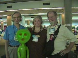 2002: WorldCon: Nesssus unfortunately couldn't attend the Convention although she was there in spirit! Ted, Carol and Larry posed next to a blow up green alien.... a little photo manipulation later and whalla!